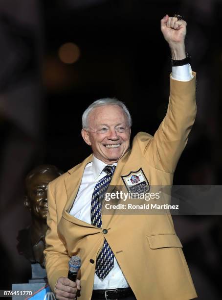 Dallas Cowboys owner Jerry Jones reacts after recieving his ring from the Pro Football Hall of Fame during a halftime cermony at AT&T Stadium on...