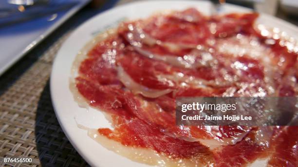 spanish cities - seville - iberian pig stock pictures, royalty-free photos & images