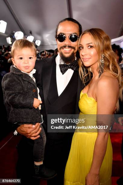 Ross Naess and Kimberly Ryan attend the 2017 American Music Awards at Microsoft Theater on November 19, 2017 in Los Angeles, California.