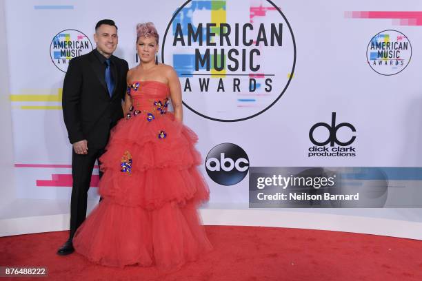 Carey Hart and P!nk attend the 2017 American Music Awards at Microsoft Theater on November 19, 2017 in Los Angeles, California.