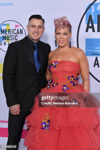 Carey Hart and P!nk attend the 2017 American Music Awards at Microsoft Theater on November 19, 2017 in Los Angeles, California.