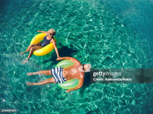 enjoying our best years - old man looking down stock pictures, royalty-free photos & images