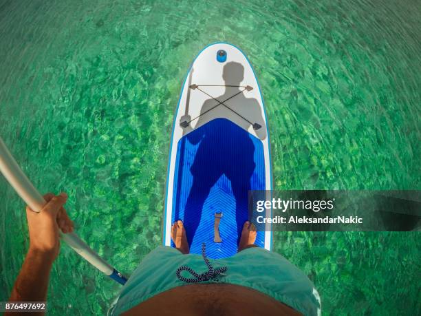 selfie on a paddle board - extreme sports stock pictures, royalty-free photos & images
