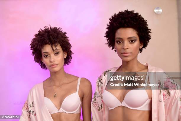 Models Samile Bermannelli and Alecia Morais pose in Hair & Makeup during 2017 Victoria's Secret Fashion Show In Shanghai at Mercedes-Benz Arena on...
