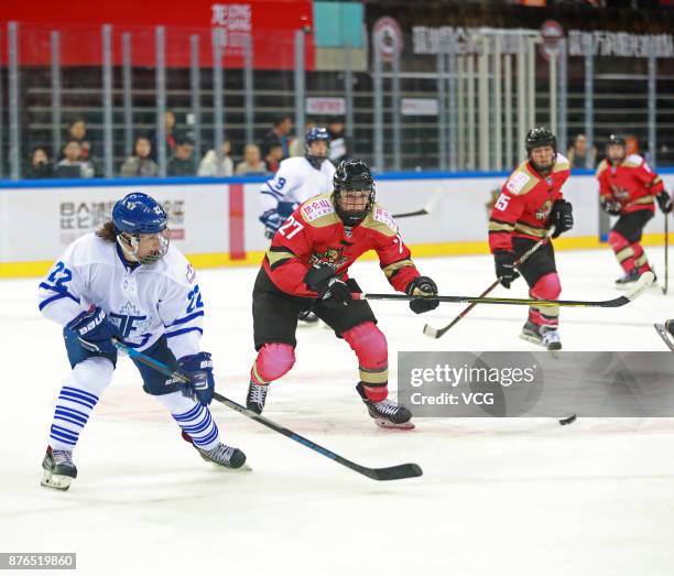 Shiann Darkangelo of Kunlun Red Star WIH and Ella Stewart of Toronto Furies vie for the puck during the 2017/2018 Canadian Women's Hockey League CWHL...