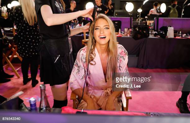 Martha Hunt does hair and makeup backstage for Victoria's Secret Fashion show on November 20, 2017 in Shanghai, China.