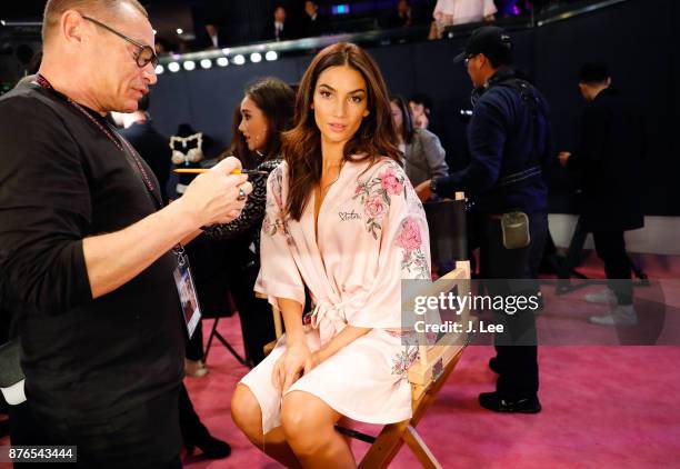 Lily Aldridge does hair and makeup backstage for Victoria's Secret Fashion show on November 20, 2017 in Shanghai, China.