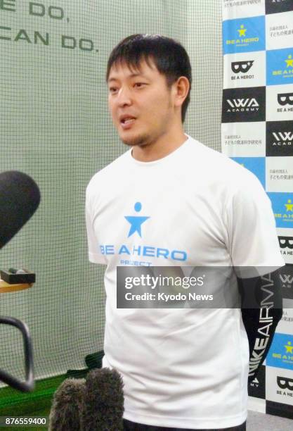 Free agent pitcher Hisashi Iwakuma speaks to reporters in Tokyo on Nov. 20, 2017. Iwakuma said he has received an offer to rejoin the Seattle...