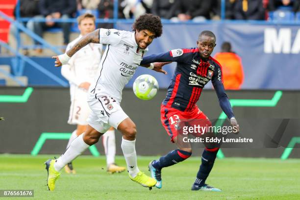 Christian Kouakou of Caen and Dante of Nice during the Ligue 1 match between SM Caen and OGC Nice at Stade Michel D'Ornano on November 19, 2017 in...