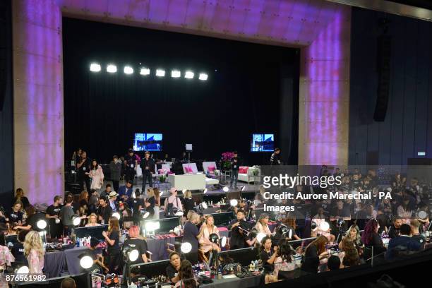 Models are getting prepared backstage ahead of the Victoria's Secret Fashion Show at the Mercedes-Benz Arena in Shanghai, China.