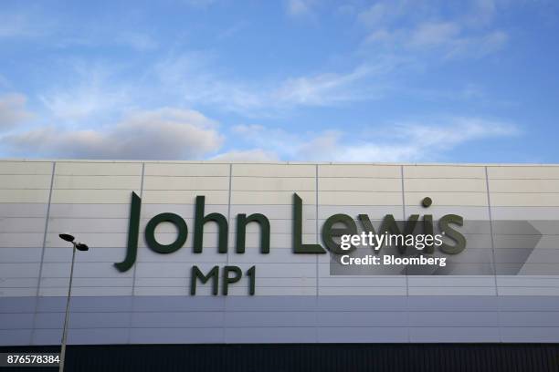 John Lewis signage sits on a building at the John Lewis Plc customer fulfilment and distribution centre in Milton Keynes, U.K., on Friday, Nov. 17,...
