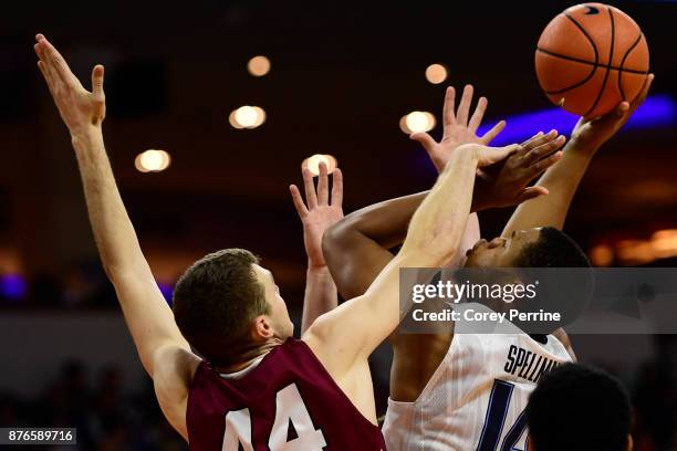 Omari Spellman of the Villanova Wildcats is fouled by Dylan Hastings of the Lafayette Leopards during the first half at the PPL Center on November...