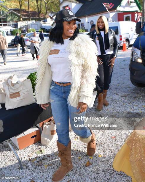 Marlo Hampton and Nene Leakes attend Thanksgiving Meal Giveaway With Nene and Marlo at Gio's on November 19, 2017 in Atlanta, Georgia.