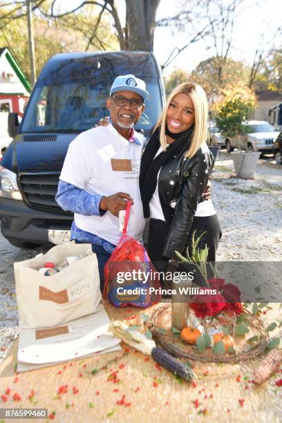 Gregg Leakes and Nene Leakes attend Thanksgiving Meal Giveaway with Nene and Marlo at Gio's on November 19, 2017 in Atlanta, Georgia.