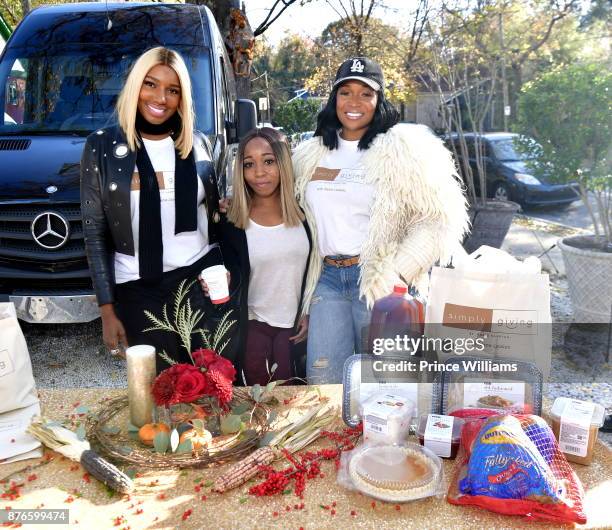 Marlo Hampton and Nene Leakes attend Thanksgiving Meal Giveaway With Nene and Marlo at Gio's on November 19, 2017 in Atlanta, Georgia.