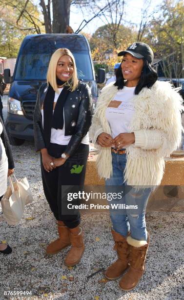 Marlo Hampton and Nene Leakes attend Thanksgiving Meal Giveaway With Nene and Marlo at Gio's on November 19, 2017 in Atlanta, Georgia.