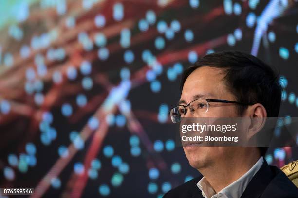 Daniel Zhang, chief executive officer of Alibaba Group Holding Ltd., looks on during a news conference in Hong Kong, China, on Monday, Nov. 20,...