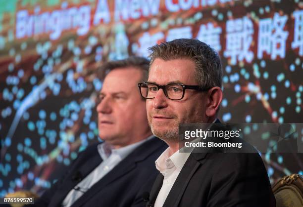 Ludovic Holinier, chief executive officer of Sun Art Retail Group Ltd., right, looks on during a news conference in Hong Kong, China, on Monday, Nov....