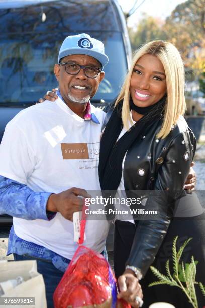 Gregg Leakes and Nene Leakes attend Thanksgiving Meal Giveaway with Nene and Marlo at Gio's on November 19, 2017 in Atlanta, Georgia.