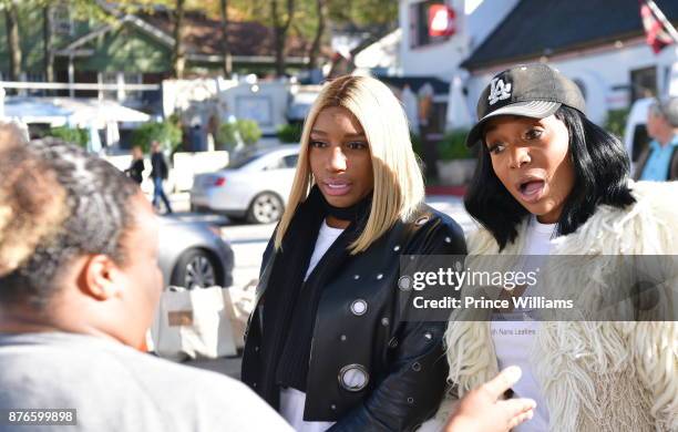 Nene Leakes and Marlo Hampton attend Thanksgiving meal Giveaway with Nene and Marlo at Gio's on November 19, 2017 in Atlanta, Georgia.