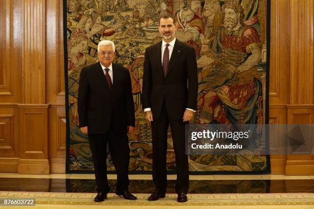 Palestinian President Mahmoud Abbas and King Felipe VI of Spain pose for a photo during their meeting at Palace of Zarzuela in Madrid, Spain on...