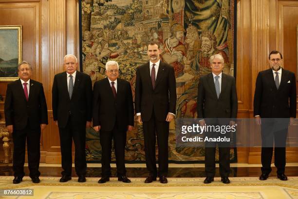 Palestinian President Mahmoud Abbas and King Felipe VI of Spain pose for a photo during their meeting at Palace of Zarzuela in Madrid, Spain on...