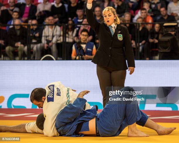 The referee calls 'Ippon' as Soslan Bostanov of Russia holds Musa Tumenov also of Russia for 20 seconds to win the o100kg bronze medal during the The...