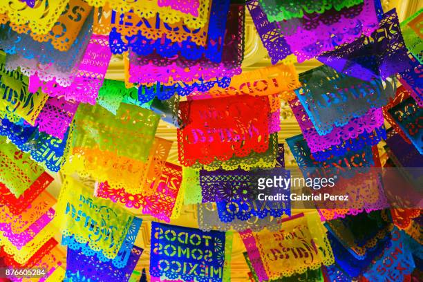 the mexican folk art of papel picado - tradition stock pictures, royalty-free photos & images