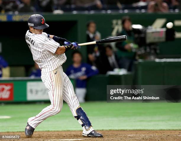 Infielder Shuta Tonosaki of Japan hits a RBI single to make it 2-0 in the bottom of fifth inning during the Eneos Asia Professional Baseball...