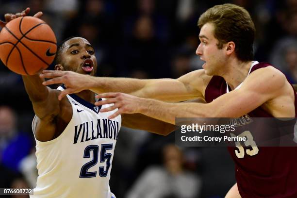 Mikal Bridges of the Villanova Wildcats reaches for the pass by Paulius Zalys of the Lafayette Leopards during the first half at the PPL Center on...