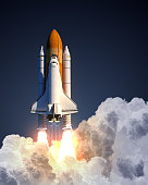 Space Shuttle Launch On Blue Background