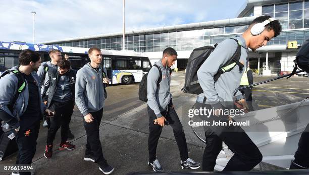 Ragnar Klavan, Joe Gomez and Dominic Solanke of Liverpool before departing for the group E Champions League match between Sevilla and Liverpool at...