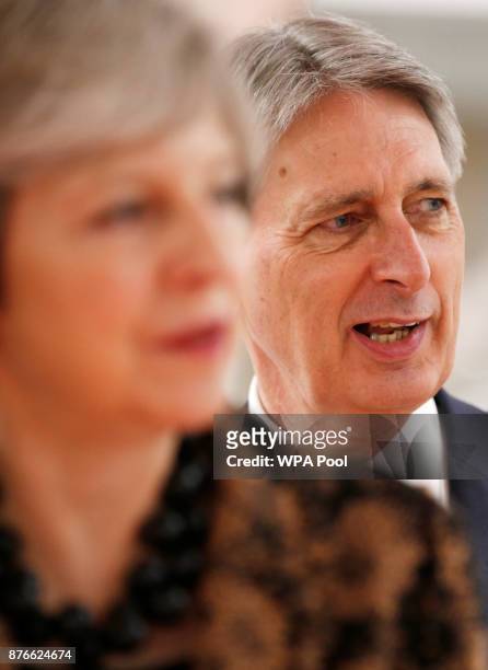 Prime Minister Theresa May and Chancellor of the Exchequer Philip Hammond visit an engineering training facility on November 20, 2017 in Birmingham,...