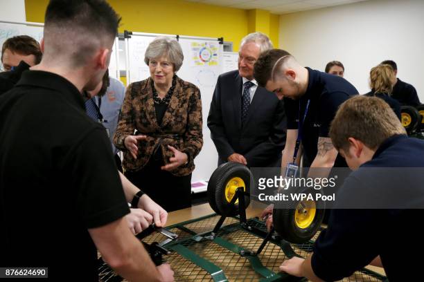 Prime Minister Theresa May visits an engineering training facility on November 20, 2017 in Birmingham, Untied Kingdom.