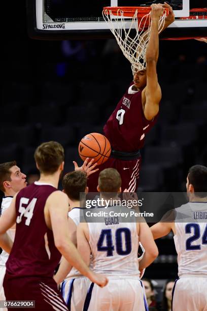 Stephens of the Lafayette Leopards hangs on the rim after a dunk against the Villanova Wildcats during the second half at the PPL Center on November...