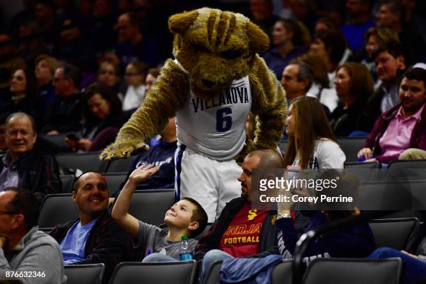 Will D. Cat, the Villanova Wildcats mascot, greets a young fan during the second half against the Lafayette Leopards at the PPL Center on November...