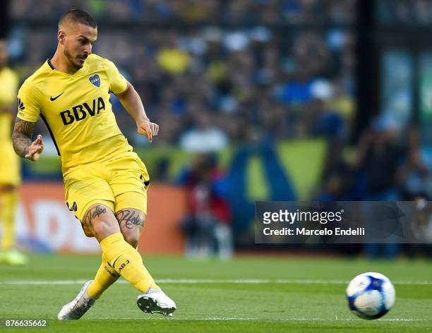 Dario Benedetto of Boca Juniors kicks the ball during a match between Boca Juniors and Racing Club as part of the Superliga 2017/18 at Alberto J....
