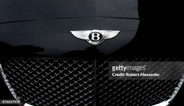 The grill of a Bentley automobile parked along a street in London, England. Bentley Motors Limited is a British manufacturer and marketer of luxury...