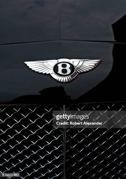 The grill of a Bentley automobile parked along a street in London, England. Bentley Motors Limited is a British manufacturer and marketer of luxury...