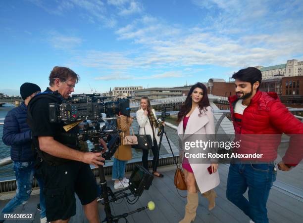 Videographer Mike Scott shoots a scene for the fourth installment of the Bollywood 'Hate Story' film series on Millennium Bridge in London, England....