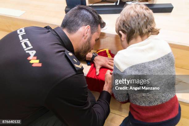 Saul Craviotto signing a spanish national team T-shirt at Pequeno Deseo charity calendar on November 20, 2017 in Madrid, Spain.