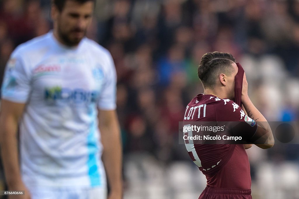 Andrea Belotti (R) of Torino FC looks dejected during the...