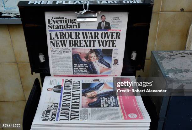 London Evening Standard newspapers are distributed on a busy street corner in London, England. The free daily tabloid newspaper is owned by Russian...