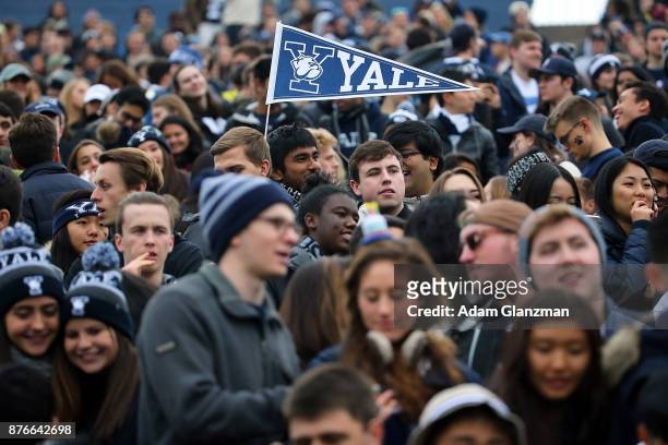 Fans in the student section cheer during a game between the Yale Bulldogs and the Harvard Crimson at the Yale Bowl on November 18, 2017 in New Haven,...