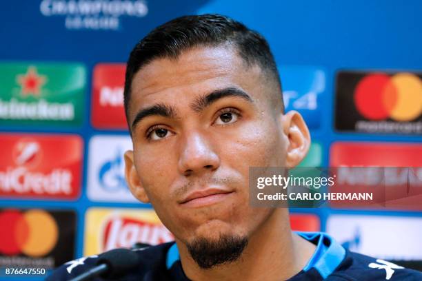 Napoli's Brazilian midfielder Allan looks on during a press conference on the eve of the UEFA Champions League Group F football match SSC Napoli vs...