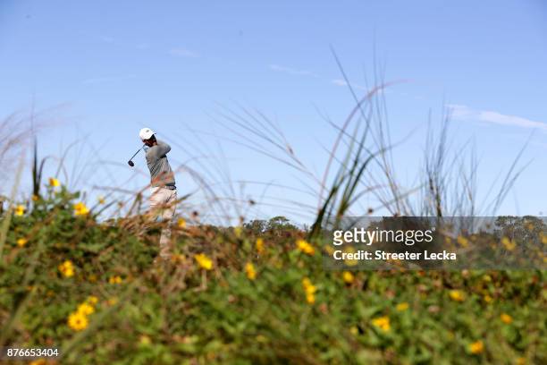 Chris Kirk of the United States plays his shot from the eighth tee during the final round of The RSM Classic at Sea Island Golf Club Seaside Course...