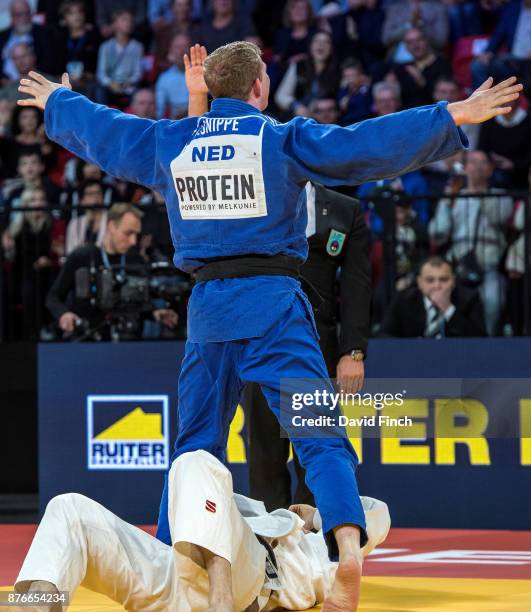 Jelle Snippe of the Netherlands celebrates defeating Ivan Remarenco of the United Arab Emirates by an ippon to win the u90kg bronze medal during the...