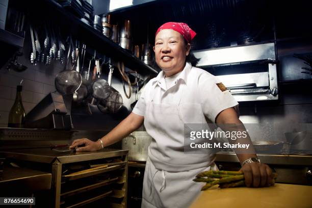 Chef Anita Lo is photographed for Out Magazine on June 26, 2014 in her restaurant Annisa in New York City. PUBLISHED IMAGE.
