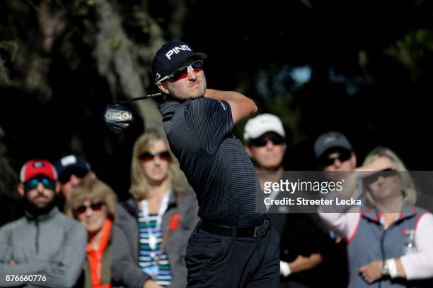 Austin Cook of United States plays his shot from the ninth tee during the final round of The RSM Classic at Sea Island Golf Club Seaside Course on...