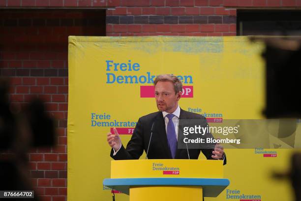 Christian Lindner, leader of the Free Democratic Party , gestures while speaking during a news conference at the FDP headquarters in Berlin, Germany,...